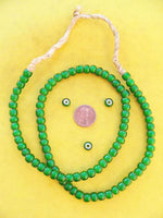 Full strand of green white heart beads