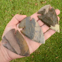 three large spear points made from indian jasper stone