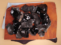 Small obsidian and dacite stone spalls and flakes