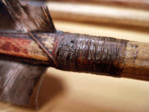 close up of sinew hafting on traditional scout arrow