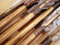 natural sinew hafting and hand carved wood arrow shafts