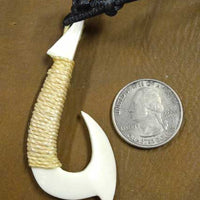 hand carved bone hook pendant