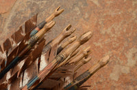 hand carved nock on traditional arrow