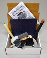 Basic starter flintknapping kit neatly placed in box
