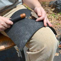 Flintknapping using rubber leg pad and billet for flaking