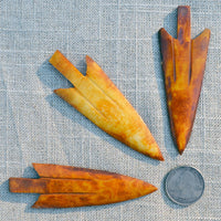 hand carved bone arrow points
