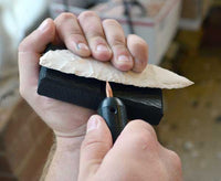 flintknapping with a hand pressure flaker notcher
