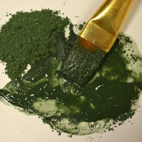 natural green earth ochre paint pigment with liquid