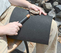 Rubber flintknapping leg pad tool and supplies