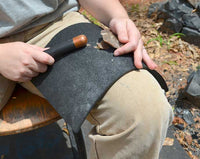 percussion flintknapping using the medium rubber leg pad and copper bopper