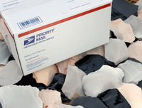 large box of mixed flintknapping stone spalls and material