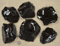 black volcanic obsidian stone spalls