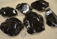 Black obsidian 3-6 inch spalled pieces of rock