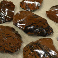 various spalls of mahogany obsidian stone