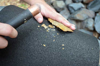 lithic flake removal using copper bopper billet and rubber leg pad