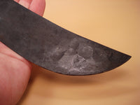 Close up of hammer imprints on knife blade