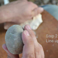Strike direction for percussion knapping using hammer stone