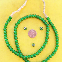 Full strand of green white heart beads