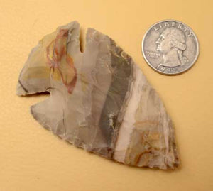colorful indian arrowhead made from flint jasper and chert