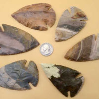 colorful flint knapped chert jasper stone indian points, spearheads, and arrowheads