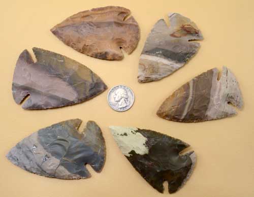 colorful flint knapped chert jasper stone indian points, spearheads, and arrowheads