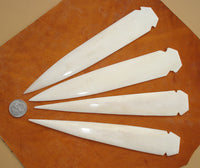 hand carved bone spear point
