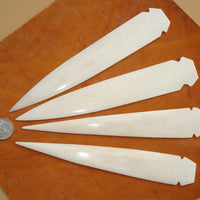 hand carved bone spear point