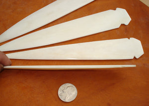 thickness of hand carved bone spear point