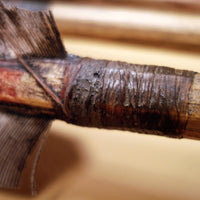 close up of sinew hafting on traditional scout arrow