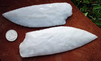large stone knife blades made by flintknapping
