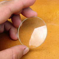 fire glass magnifying lens for making primitive fire