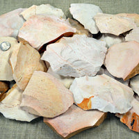 Pile of Keokuk chert spalls for flintknapping material