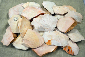 Pile of Keokuk chert spalls for flintknapping material