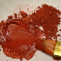 dark red earth pigment paint with liquid