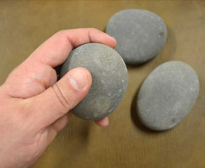 medium hammerstone in hand