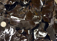 Gloss texture of black obsidian spalls
