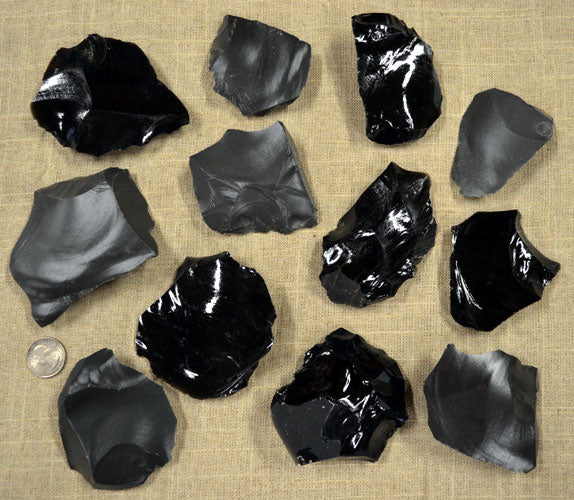 small spalls and flakes of obsidian and dacite stone for flintknapping