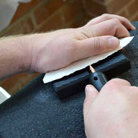 Pressure flaking using the rubber hand pad flintknapping tool