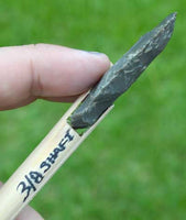 Side view of stone indian arrowhead
