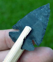 Indian agate stone arrowhead on shaft
