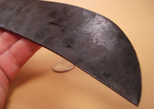 detail of forged pitting on metal knife blade